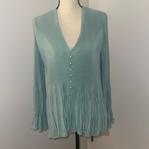 Beautiful blouse in mint green. Never worn!